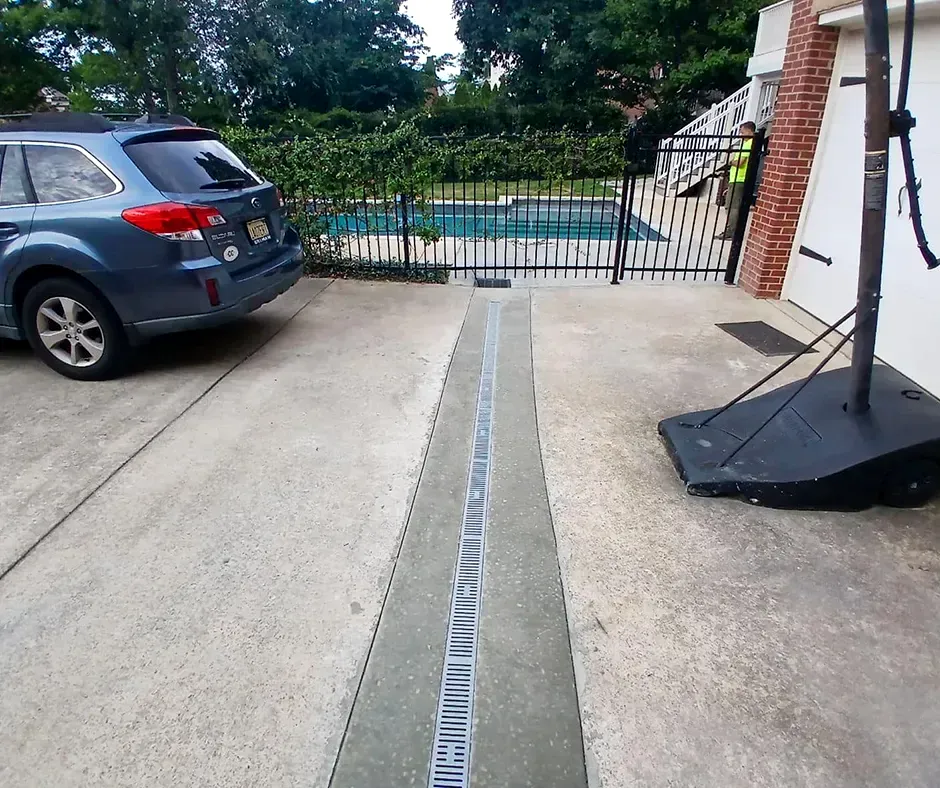 Gravel and Pipe Setup for French Drain Installation in Boston, MA Gravel and Pipe Setup for French Drain Installation in Boston, MA